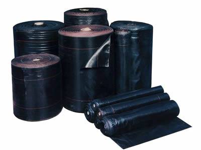 There are rolls of non-woven silt fence fabric in black.