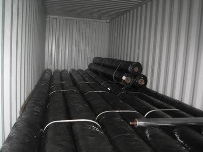 Rolls of silt fence fabrics are placed on a truck and ready to deliver.